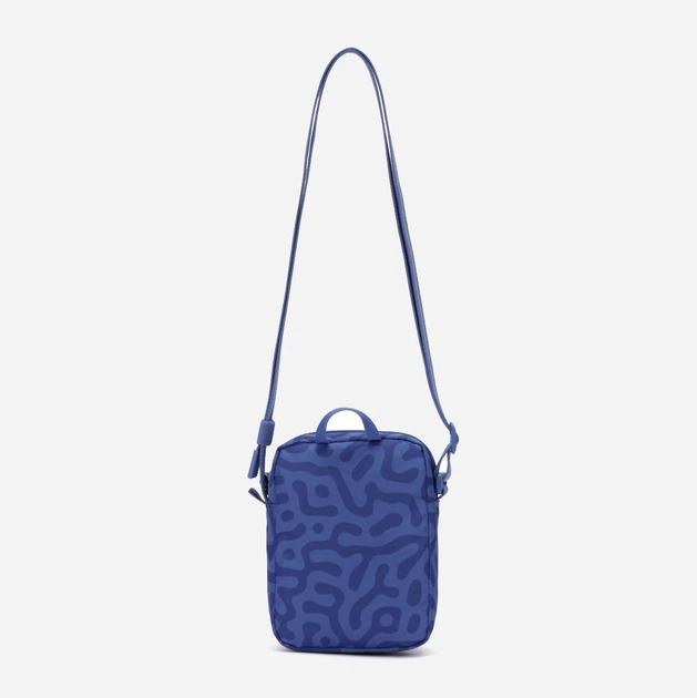 Сумка кросс-боди через плечо женская тканевая маленькая PacSafe GO Micro Crossbody 35130 Небесно-голубая (35130827) - Фото 4 Сумка кросс-боди через плечо женская тканевая маленькая PacSafe GO Micro Crossbody 35130 Небесно-голубая (35130827) - изображение 4