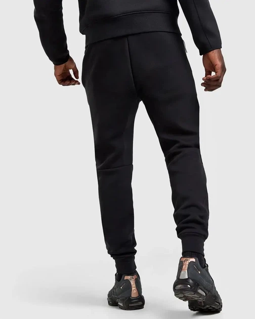 Штаны Nike Tech Fleece x Central Cee x Syna World в чёрном цвете (M) - Фото 2 Штаны Nike Tech Fleece x Central Cee x Syna World в чёрном цвете (M) - изображение 2