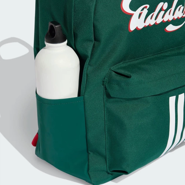 Рюкзак спортивный тканевый 27 л вмещает формат А4 Adidas Tiro Graphic Backpack Ii KD9878 Зеленый (4068805206979) - Фото 5 Рюкзак спортивный тканевый 27 л вмещает формат А4 Adidas Tiro Graphic Backpack Ii KD9878 Зеленый (4068805206979) - изображение 5