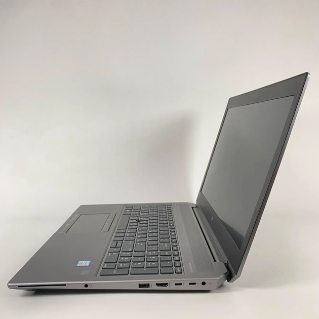 Мобильная рабочая станция Б-класс HP zBook 15 G6 / 15.6" (1920x1080) IPS / Intel Core i7-9750H (6 (12) ядер по 2.6 - 4.5 GHz) / 16 GB DDR4 / 300 GB SSD / nVidia Quadro T2000, 4 GB GDDR5, 128-bit / Fingerprint / WebCam / HDMI б/у + Подарок Мышь / USB - изображение 5
