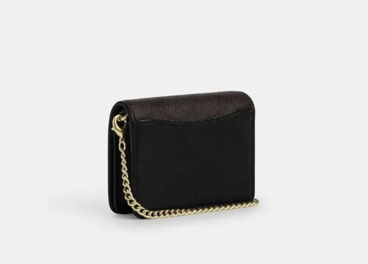 Сумка-гаманець Coach Mini Wallet on a Chain Signature Canvas - Фото 6 Сумка-гаманець Coach Mini Wallet on a Chain Signature Canvas - зображення 6