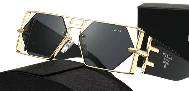 Сонцезахисні окуляри Prada Gold /Dark Grey - Фото 1 Сонцезахисні окуляри Prada Gold /Dark Grey - изображение 1