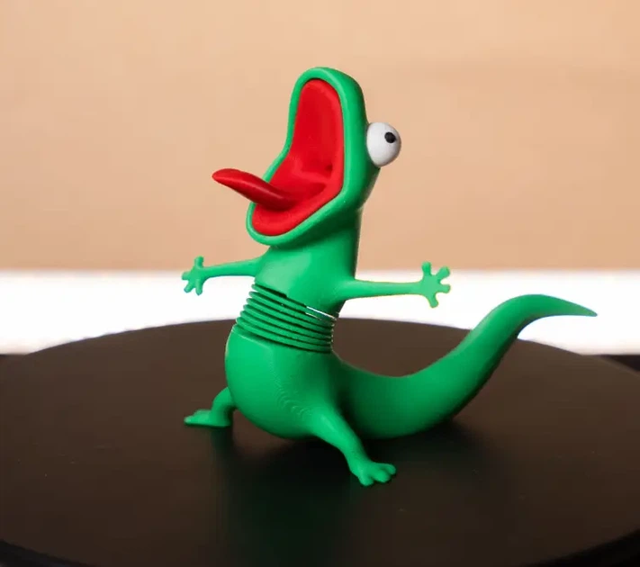 Подвижная ящерица Том на пружине. Lizard Tom — антистресс-игрушка, фигурка персонажа из мультфильма «Хопс». - изображение 2