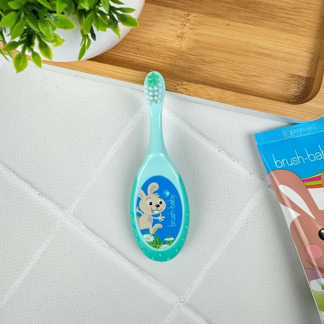 Зубна щітка Brush-Baby Floss Brush від 0 до 3 років бірюзова 1 шт - Фото 1 Зубна щітка Brush-Baby Floss Brush від 0 до 3 років бірюзова 1 шт - зображення 1