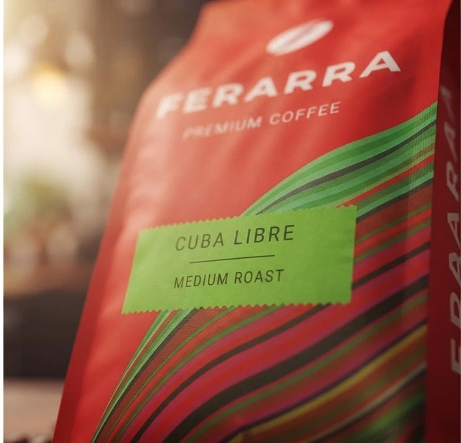 Зернова кава Ferarra Cuba Libre 1 кг ароматизована кава в зернах з кубинським ромом натуральна кава середнього обсмажування для приготування еспресо насичений напій інтенсивність 7 з кислинкою горіховим ароматом для дому кавомашини офісу - Фото 6 Зернова кава Ferarra Cuba Libre 1 кг ароматизована кава в зернах з кубинським ромом натуральна кава середнього обсмажування для приготування еспресо насичений напій інтенсивність 7 з кислинкою горіховим ароматом для дому кавомашини офісу - зображення 6