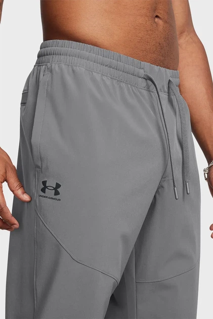 Чоловічі сірі спортивні штани UA Vibe Woven Jogger сірі Under Armour M 1386557-025 - Фото 4 Чоловічі сірі спортивні штани UA Vibe Woven Jogger сірі Under Armour M 1386557-025 - зображення 4