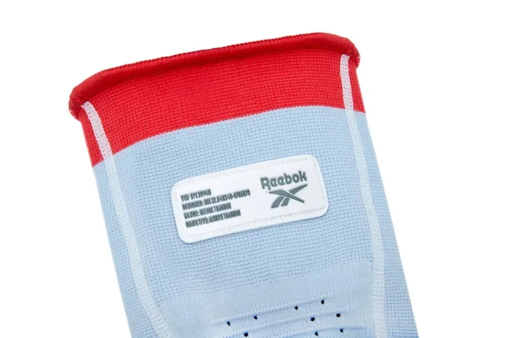 Фіксатор для ліктя Reebok Speedwick Elbow Support білий, червоний Уні L - Фото 3 Фіксатор для ліктя Reebok Speedwick Elbow Support білий, червоний Уні L - зображення 3