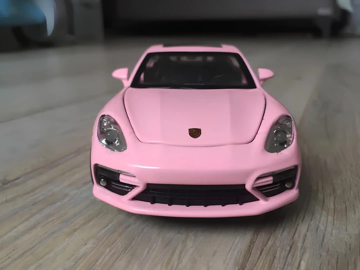 Модель автомобиля Porsche Panamera масштаб: 1:32. Порш Панамера розового цвета - Фото 4 Модель автомобиля Porsche Panamera масштаб: 1:32. Порш Панамера розового цвета - изображение 4