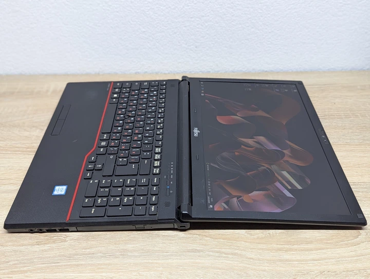 Ноутбук Fujitsu E556: 15.6 Full HD, Intel Core i7-6500U, 8 GB DDR4, Intel HD Graphics, SSD 128Gb - Б/У - Фото 6 Ноутбук Fujitsu E556: 15.6 Full HD, Intel Core i7-6500U, 8 GB DDR4, Intel HD Graphics, SSD 128Gb - Б/У - изображение 6