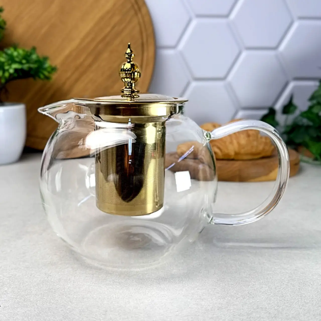 Стеклянный чайник-кофейник для плиты 950 мл Kandy GK-5801 с золотистыми элементами и удобным заварочным фильтром Прозрачный - Фото 5 Стеклянный чайник-кофейник для плиты 950 мл Kandy GK-5801 с золотистыми элементами и удобным заварочным фильтром Прозрачный - изображение 5