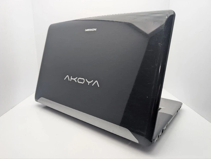 Ноутбук Medion Akoya E7220 / 17.3" (1600x900) TN / Intel Core i5-2540M (2 (4) ядра по 2.6 - 3.3 GHz) / 6 GB DDR3 / 500 GB HDD / Intel HD Graphics 3000 / WebCam / DVD-ROM б/у - Фото 8 Ноутбук Medion Akoya E7220 / 17.3" (1600x900) TN / Intel Core i5-2540M (2 (4) ядра по 2.6 - 3.3 GHz) / 6 GB DDR3 / 500 GB HDD / Intel HD Graphics 3000 / WebCam / DVD-ROM б/у - изображение 8
