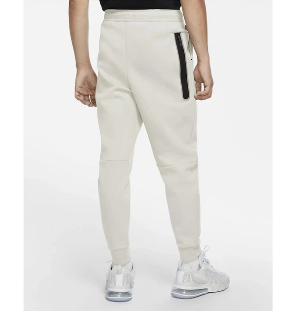 Брюки чоловічі Nike M Nsw Tch Flc Jggr L Світло-кремовий CU4495-072 - зображення 6