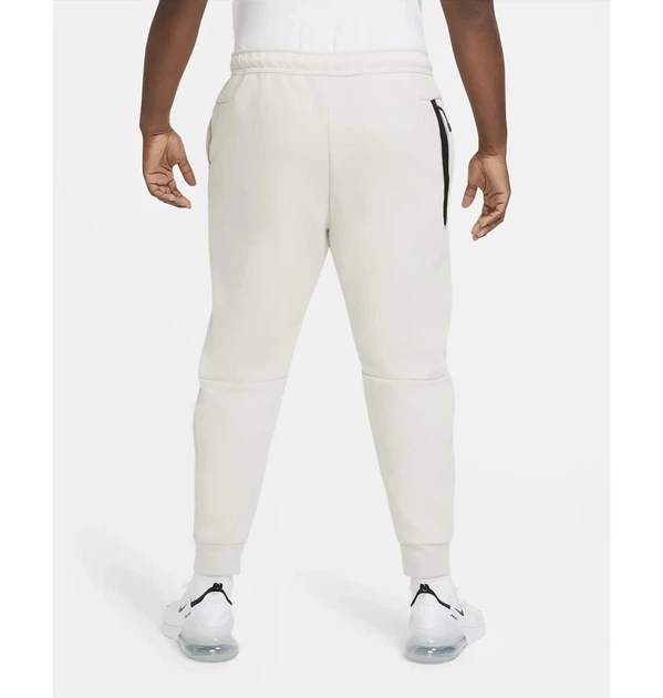 Брюки чоловічі Nike M Nsw Tch Flc Jggr L Світло-кремовий CU4495-072 - зображення 9