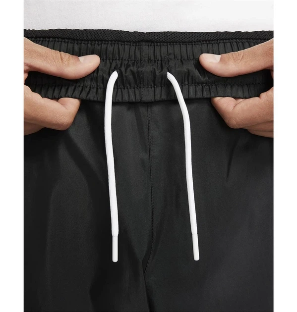 Брюки мужские Nike Windrunner XL Чорний DX0653-011 - Фото 9 Брюки мужские Nike Windrunner XL Чорний DX0653-011 - изображение 9