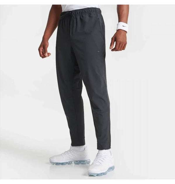 Брюки чоловічі Nike Dri-Fit Unlimited Tapered Leg 2XL Чорний FB7548-010 - зображення 2