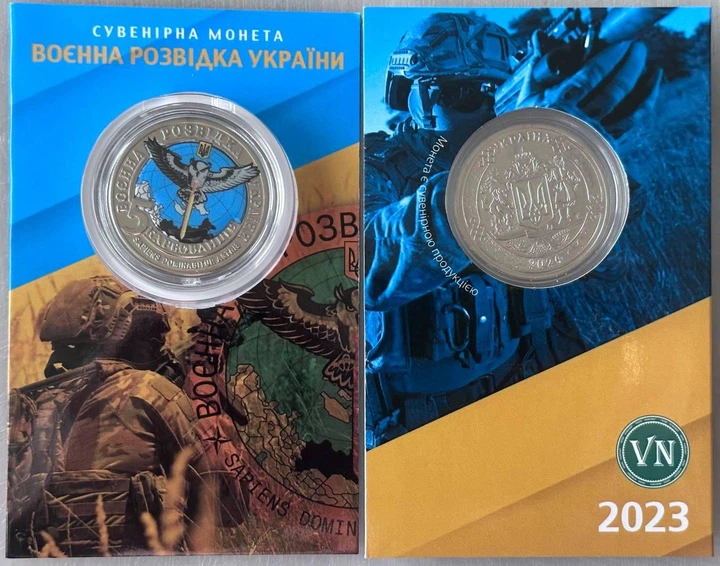 Воєнна Розвідка України 2023 рік Сувенірна монета України в буклеті UNC - Фото 1 Воєнна Розвідка України 2023 рік Сувенірна монета України в буклеті UNC - изображение 1