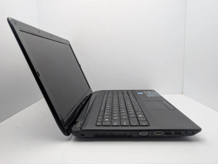 Ноутбук Asus X52N / 15.6" (1366x768) TN / AMD Phenom ll N830 (2 ядра по 2.1 GHz) / 6 GB DDR3 / 320 GB HDD / AMD Radeon HD 4200 Graphics / WebCam / DVD-ROM / АКБ не держит б/у - Фото 4 Ноутбук Asus X52N / 15.6" (1366x768) TN / AMD Phenom ll N830 (2 ядра по 2.1 GHz) / 6 GB DDR3 / 320 GB HDD / AMD Radeon HD 4200 Graphics / WebCam / DVD-ROM / АКБ не держит б/у - изображение 4