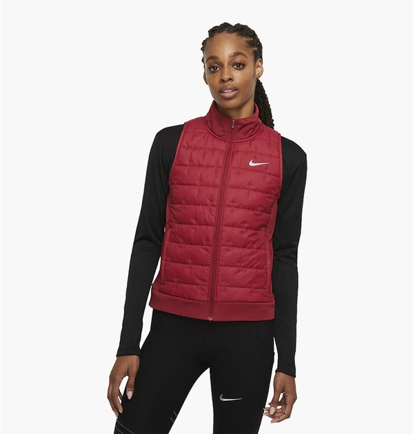 Жилетка женская Nike Therma-Fit Red M Красный DD6084-690 - Фото 1 Жилетка женская Nike Therma-Fit Red M Красный DD6084-690 - изображение 1