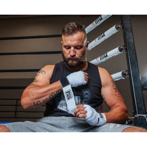 Бинт для спорта Title Boxing Select 180" Semi Elastic Mexican 4.5м White (SMHW XL WH) Title SMHW XL WH 1079111 - изображение 4