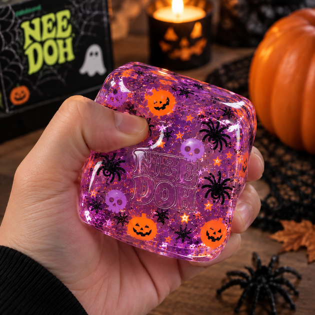 Антистрес сквіш Кубик льоду Halloween NeeDoh Nice Cube фіолетовий з гарбузами та павуками - Фото 3 Антистрес сквіш Кубик льоду Halloween NeeDoh Nice Cube фіолетовий з гарбузами та павуками - зображення 3