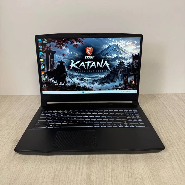 Игровой ноутбук MSI GF66 Katana 11UC / 15.6" (1920x1080) IPS / Intel Core i5-11400H (6 (12) ядер по 2.7 - 4.5 GHz) / 8 GB DDR4 / 512 GB SSD NVMe / nVidia GeForce RTX 3050, 4 GB GDDR6, 128-bit / WebCam б/у - Фото 2 Игровой ноутбук MSI GF66 Katana 11UC / 15.6" (1920x1080) IPS / Intel Core i5-11400H (6 (12) ядер по 2.7 - 4.5 GHz) / 8 GB DDR4 / 512 GB SSD NVMe / nVidia GeForce RTX 3050, 4 GB GDDR6, 128-bit / WebCam б/у - изображение 2