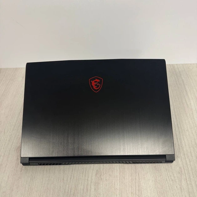 Игровой ноутбук MSI GF65 Thin 10UE / 15.6" (1920x1080) IPS / Intel Core i5-10500H (6 (12) ядер по 2.5 - 4.5 GHz) / 8 GB DDR4 / 512 GB SSD NVMe / nVidia GeForce RTX 3060, 6 GB GDDR6, 192-bit / WebCam б/у - Фото 3 Игровой ноутбук MSI GF65 Thin 10UE / 15.6" (1920x1080) IPS / Intel Core i5-10500H (6 (12) ядер по 2.5 - 4.5 GHz) / 8 GB DDR4 / 512 GB SSD NVMe / nVidia GeForce RTX 3060, 6 GB GDDR6, 192-bit / WebCam б/у - изображение 3