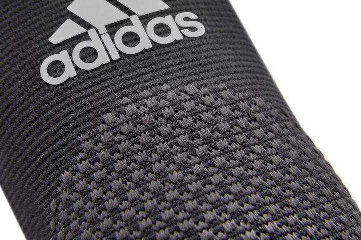 Фіксатор Ліктя Adidas Performance Elbow Support(ADSU-13331) M Чорний - Фото 4 Фіксатор Ліктя Adidas Performance Elbow Support(ADSU-13331) M Чорний - зображення 4