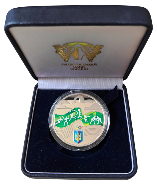 Срібна монета НБУ "Ігри ХХХІ Олімпіади" Олімпіада в Ріо 2016. Тираж 3 500 - Фото 3 Срібна монета НБУ "Ігри ХХХІ Олімпіади" Олімпіада в Ріо 2016. Тираж 3 500 - зображення 3