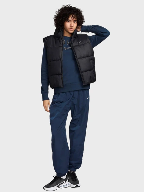 Теплый жилет женский Nike W Nsw Tf Synfl Nk Clsc Vest FZ5922-010 L Черный (197596688221) - Фото 2 Теплый жилет женский Nike W Nsw Tf Synfl Nk Clsc Vest FZ5922-010 L Черный (197596688221) - изображение 2