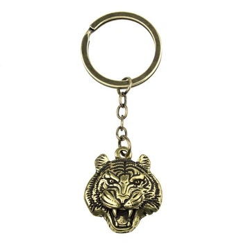Брелок Тигр Netsuke Металл Объемное изображение 8х2.4х0.2 см Бронзовый (26927u)