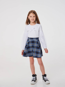 Модные школьные юбки для девочек: весна 2023 год