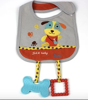 Слюнявчик с карманом и игрушками прорезывателями SKKBaby Собака