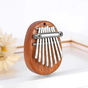 Калимба Портативный музыкальный инструмент Kalimba пальчиковое мини-пианино с 8 клавишами 7х5х2см