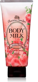 Молочко для тела KOSE Precious Honey Peach с ценными маслами и медово-персиковым ароматом 200 г