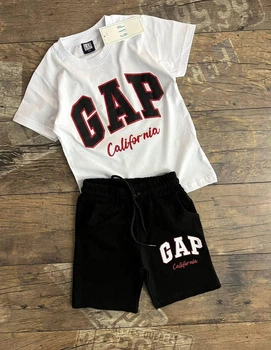 Детский костюм Gap на мальчика 104-110 см белый с черным