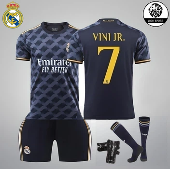 Комплект футбольная детская форма Lion SPORT Real Madrid VINI JN. (Винисиус Жуниор) 7, с гетрами (размер 34-38) и щитками, размер 20 размер, рост 115-125 см, черный с оранжевым