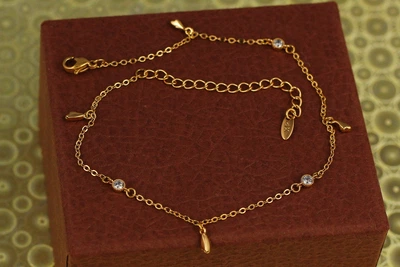 Браслет Xuping Jewelry на ногу з каменями і підвісками пелюска 28 см золотистий