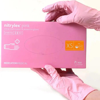 Рукавички Nitrylex Pink розмір ХS нітрилові рожеві 100 шт (50 пар) Mercator Medical