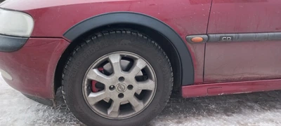 Комплект черных накладок на арки (4 шт) из ABS пластика для Opel Vectra B (1995-2002 годов)