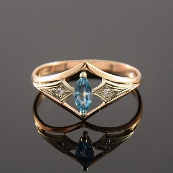Кольцо из красного и белого золота с топазом 18 K-0143