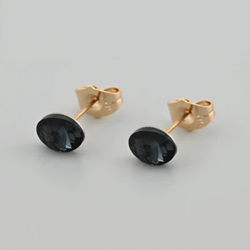 Сережки з кристалами Swarovski 53406 розмір 8х6 мм колір срібна ніч вага 1.0 г позолота 18К