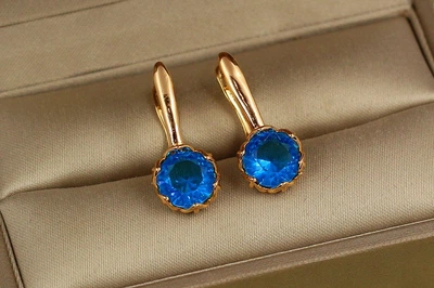 Сережки Xuping Jewelry велична простота з блакитним каменем 2.3 см золотисті