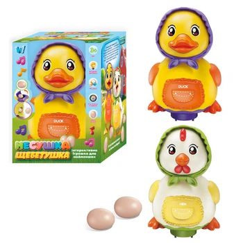 Музична курочка 32772 "WToys", 2 кольори, ОЗВУЧУВАННЯ УКРАЇНСЬКОЮ МОВОЮ, пісня, підсвічування, колесо вільного ходу, несе яйця, в коробці