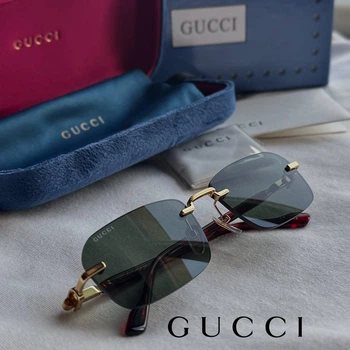 Солнцезащитные очки модели Gucci GG1221S 007 - зеленая линза