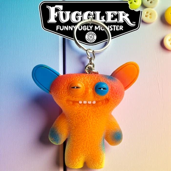 Пластиковый брелок Фуглер Fuggler Funny Ugly Monster (оранжевый монстр) 7 см (Zuru, коллекционный)