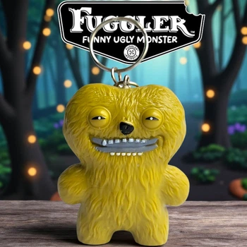 Пластиковый брелок Фуглер Fuggler Funny Ugly Monster (жёлтый монстр с серебристыми зубами) 7 см (Zuru, коллекционный)