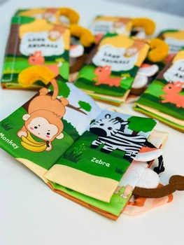 М'яка розвиваюча книжка шуршалка з тваринами та пищалкою сенсорна перша книжечка шарудіння тканинна для малюка