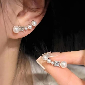 Сережки з каменем та перлинами