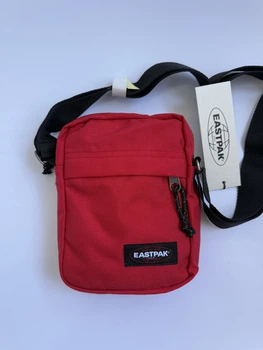 Барсетка eastpak червоний колір через плече
