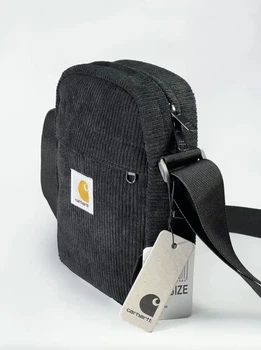 Вінтажна сумка через плече Carhartt у чорному кольорі.